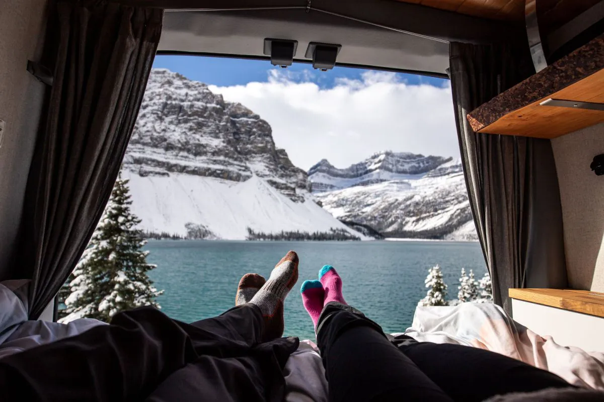 The view from inside an RV parked at a remote mountain lake, the kind of off-grid spot where staying online depends on cellular internet
